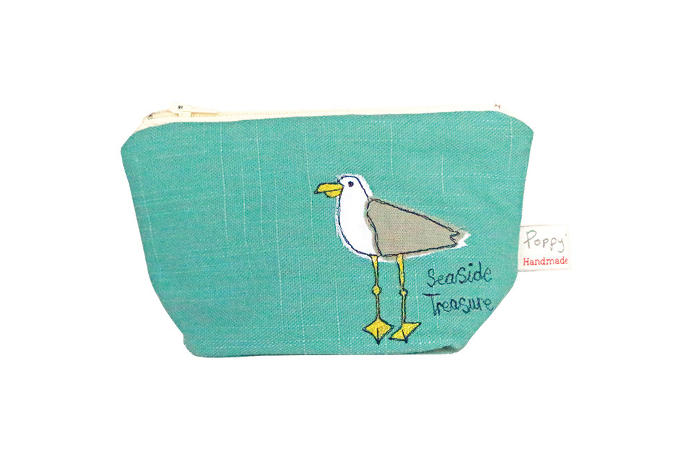 Seagull makeup bag, $26 
Cory Farms Past and Presents: 3124 East Main Road, Portsmouth. 401-683-3124, CoryFarmsRI.com