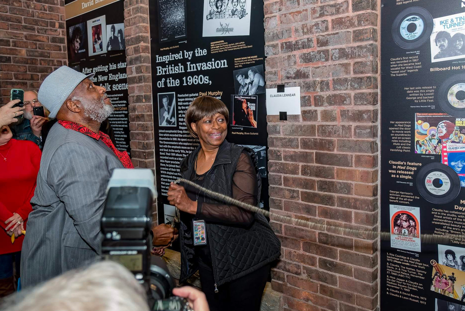Taj Mahal proudly looks on as friend Claudia Lennear is inducted into the Rhode Island Music Hall of Fame in 2019