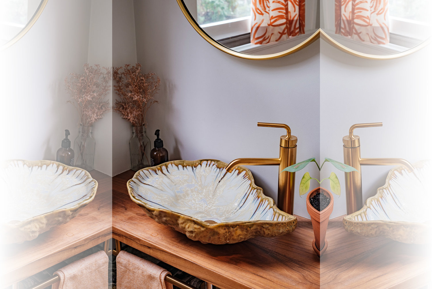 A hand-glazed ceramic oyster sink is a stand-out feature