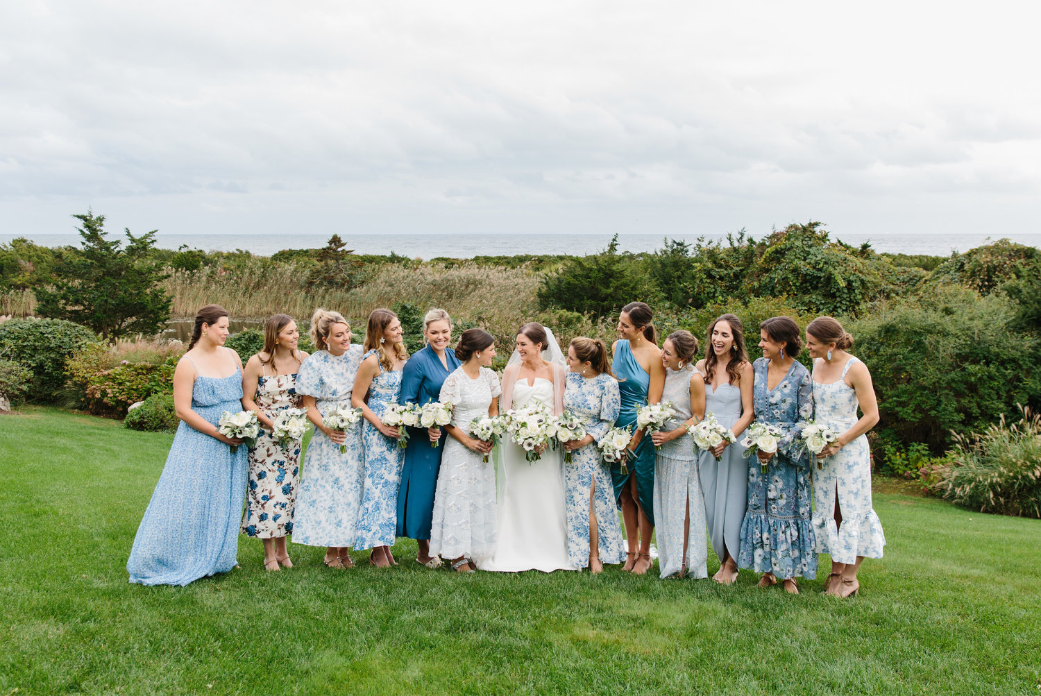 The simple palette of blue and white was given to these friends for a coastal wedding at a private home. They ended up choosing all different shades from azure to dusty blue, and patterns from whimsical to floral to solid