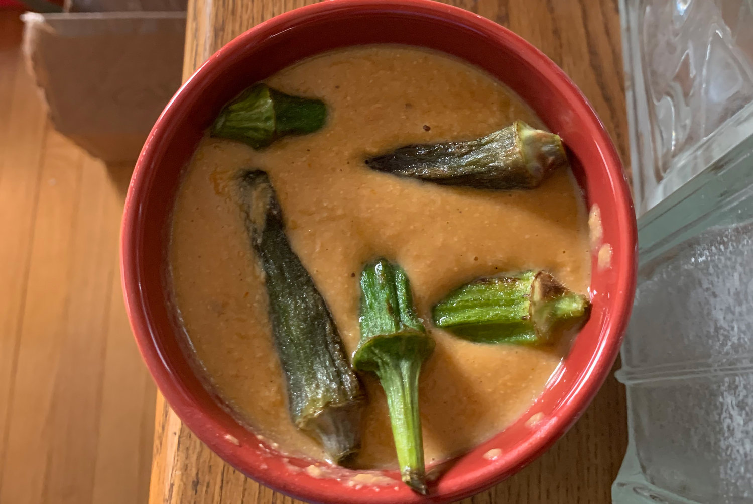Creamy Coconut-Cashew Soup with okra, corn, and tomatoes