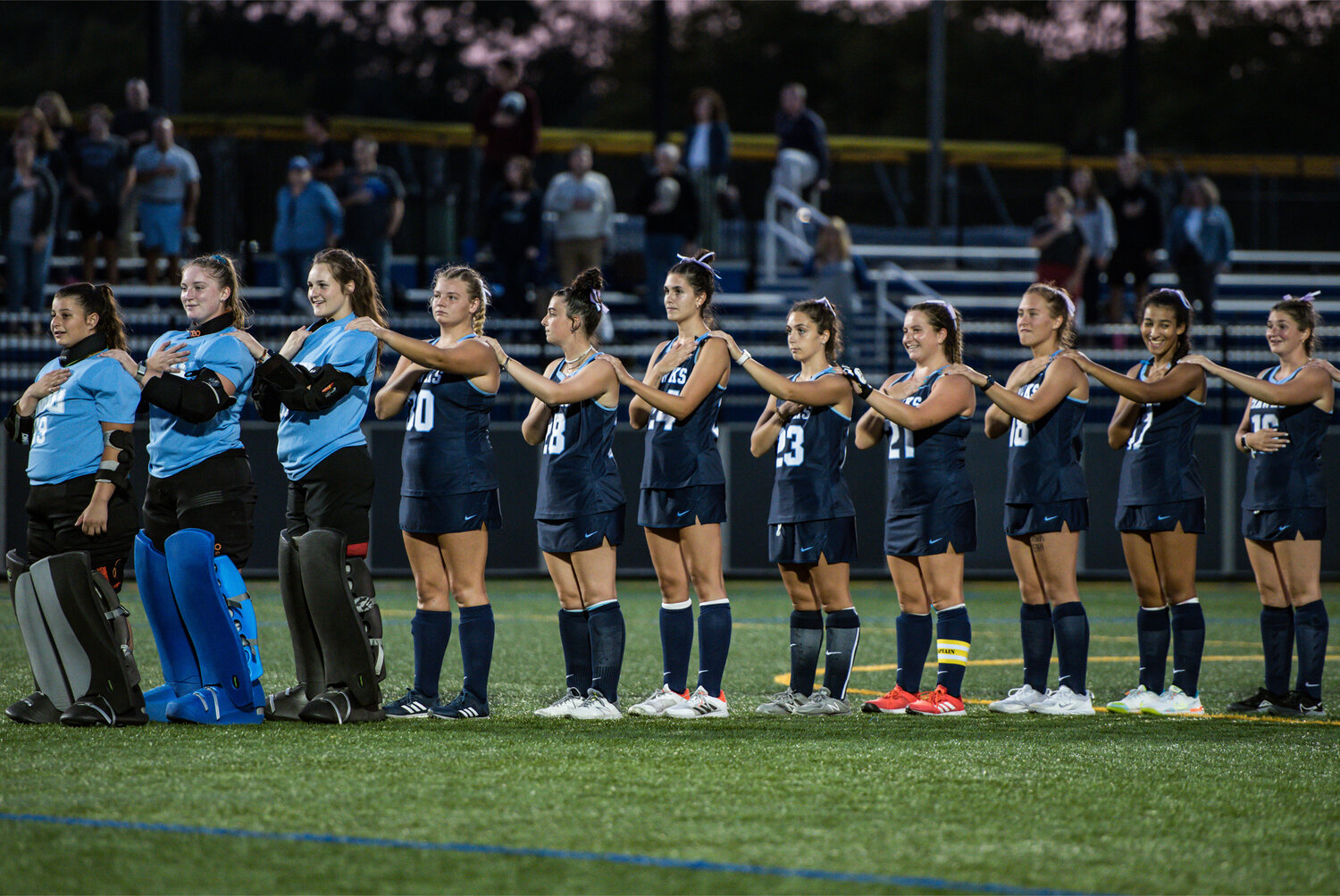 Foley (#23) with her Hawks teammates at Roger Williams University