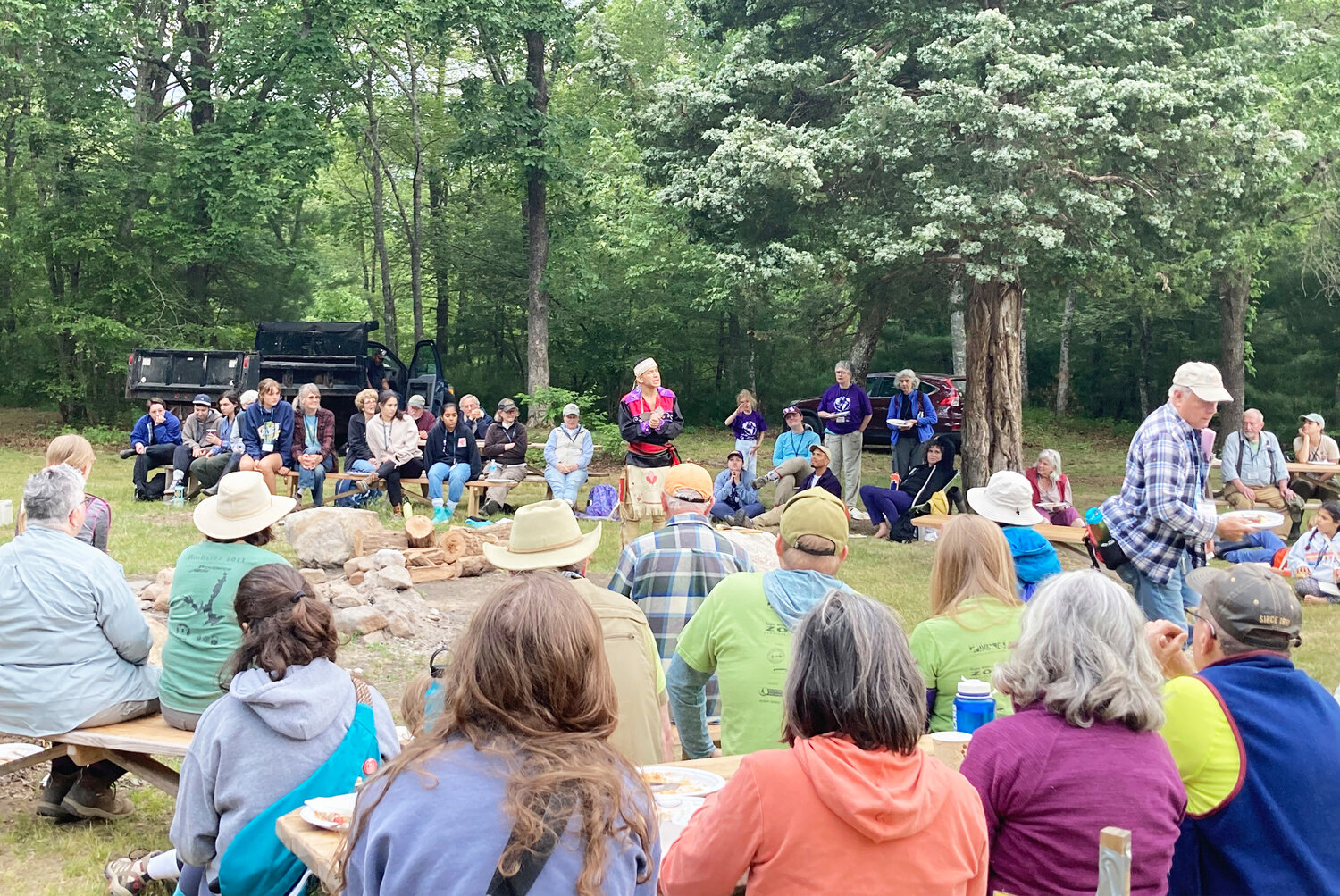 Narragansett Tribal Member Thawn Harris shares traditional stories over the campfire